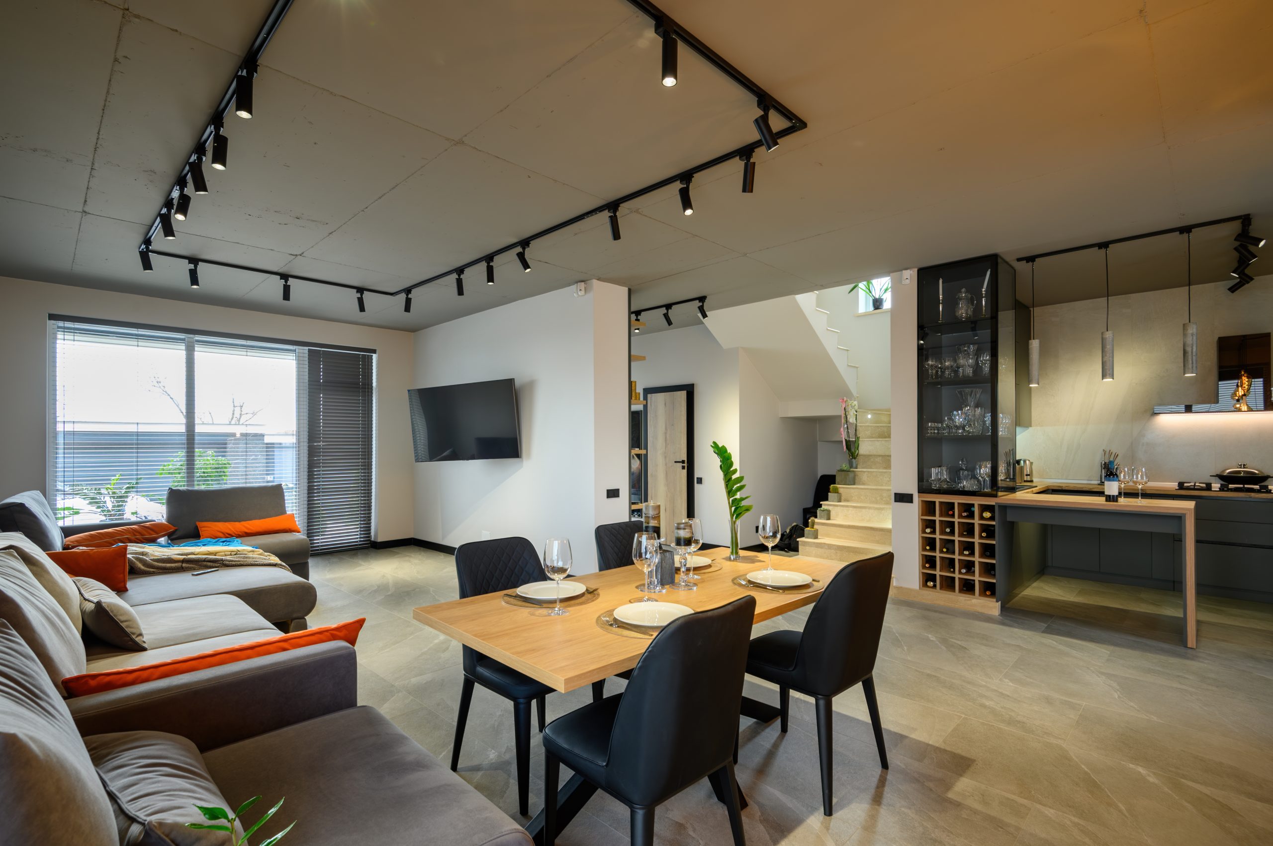Modern,Luxurious,Studio,Apartment,Interior,With,Dining,Table,In,Large